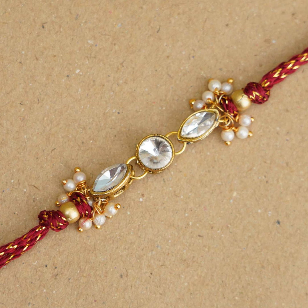 Handmade White Kundan & Pearl Rakhi With Roli Chawal