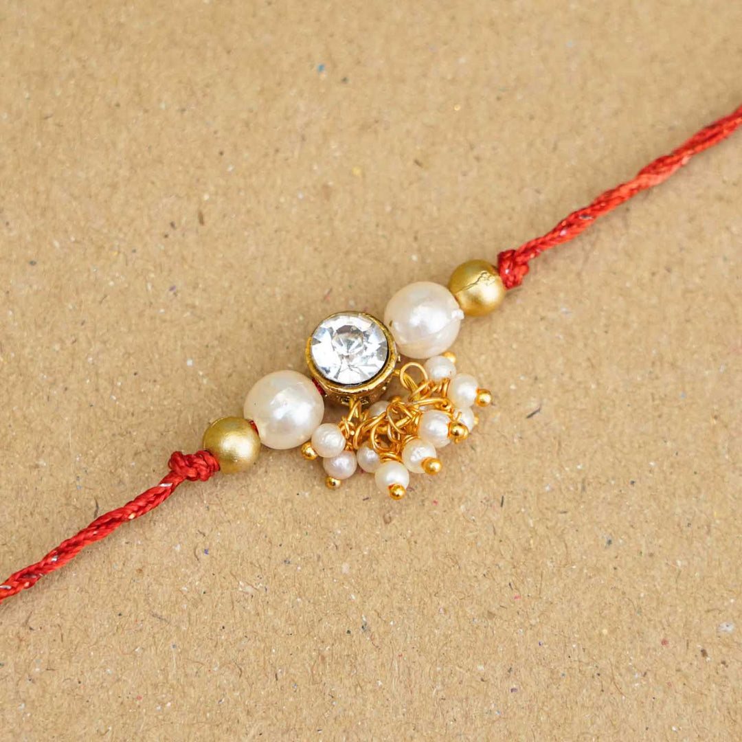 Handmade Kundan Red and White Beads Rakhi With Roli Chawal