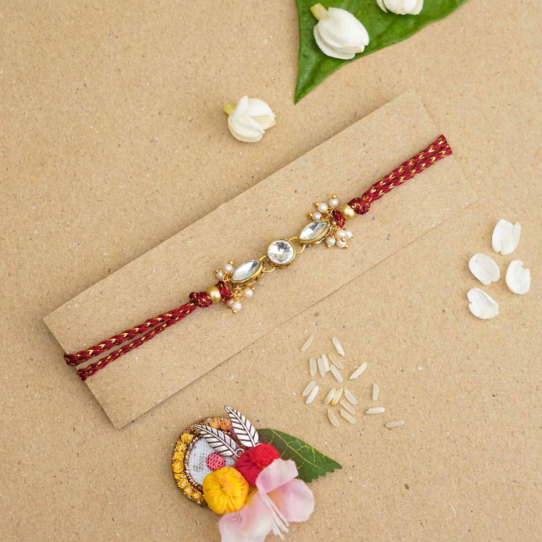 Handmade White Kundan & Pearl Rakhi With Roli Chawal