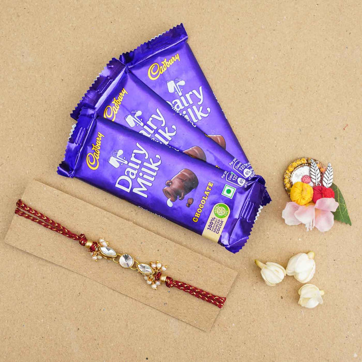 Handmade White Kundan & Pearl Rakhi With Roli Chawal