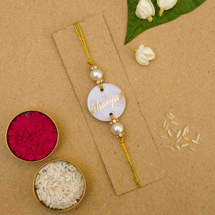 Personalized Handmade Lavendar Resin Rakhi With Roli Chawal