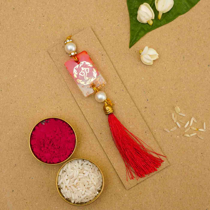 Handmade Red Resin Ganesha Lumba Rakhi for Bhabhi With Roli Chawal