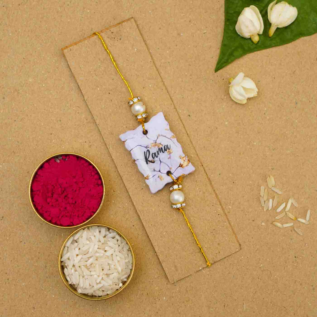 Personalized Handmade Lavendar Resin Rakhi With Roli Chawal