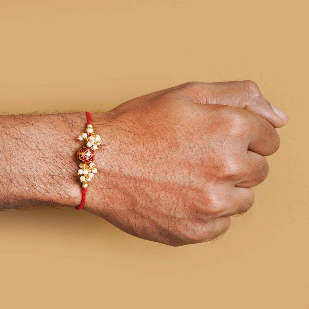 Handmade Red Meena Bead & Pearl Rakhi With Roli Chawal