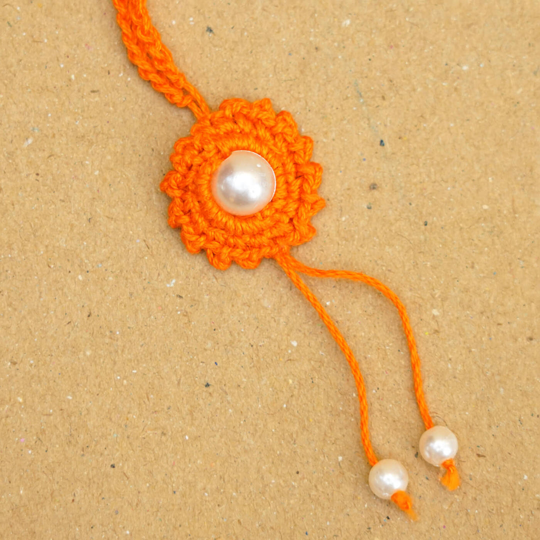 Handmade Crochet Round Pearl Cotton Lumba Rakhi for Bhabhi With Roli Chawal