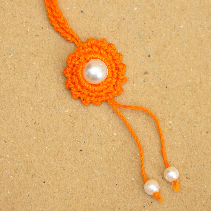 Handmade Crochet Round Pearl Cotton Lumba Rakhi for Bhabhi With Roli Chawal