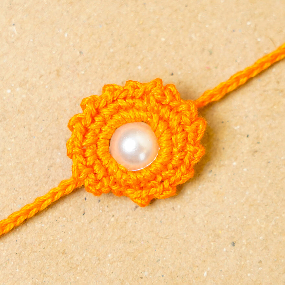 Handmade Crochet Round Pearl Cotton Rakhi With Roli Chawal