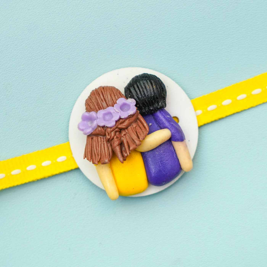 Reusable Miniature Clay X-Large Rakhi With Roli Chawal