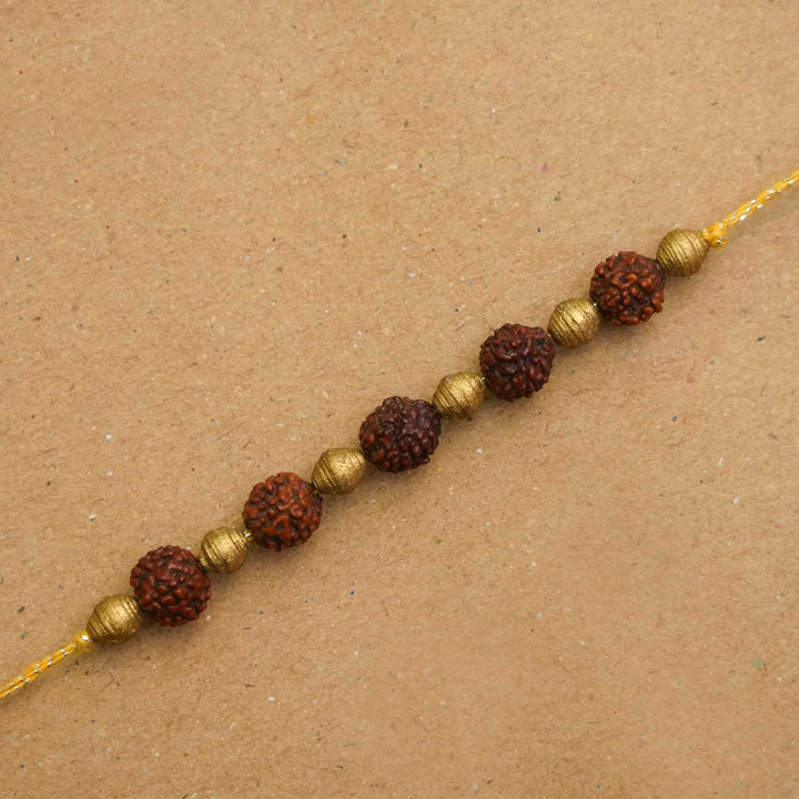 Handmade Ecofriendly Rudraksh Recycled Paper Rakhi With Roli Chawal