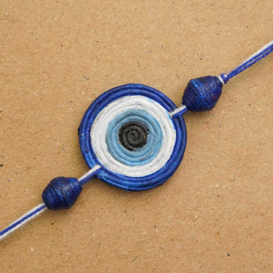 Handmade Ecofriendly Evil Eye Recycled Paper Rakhi With Roli Chawal