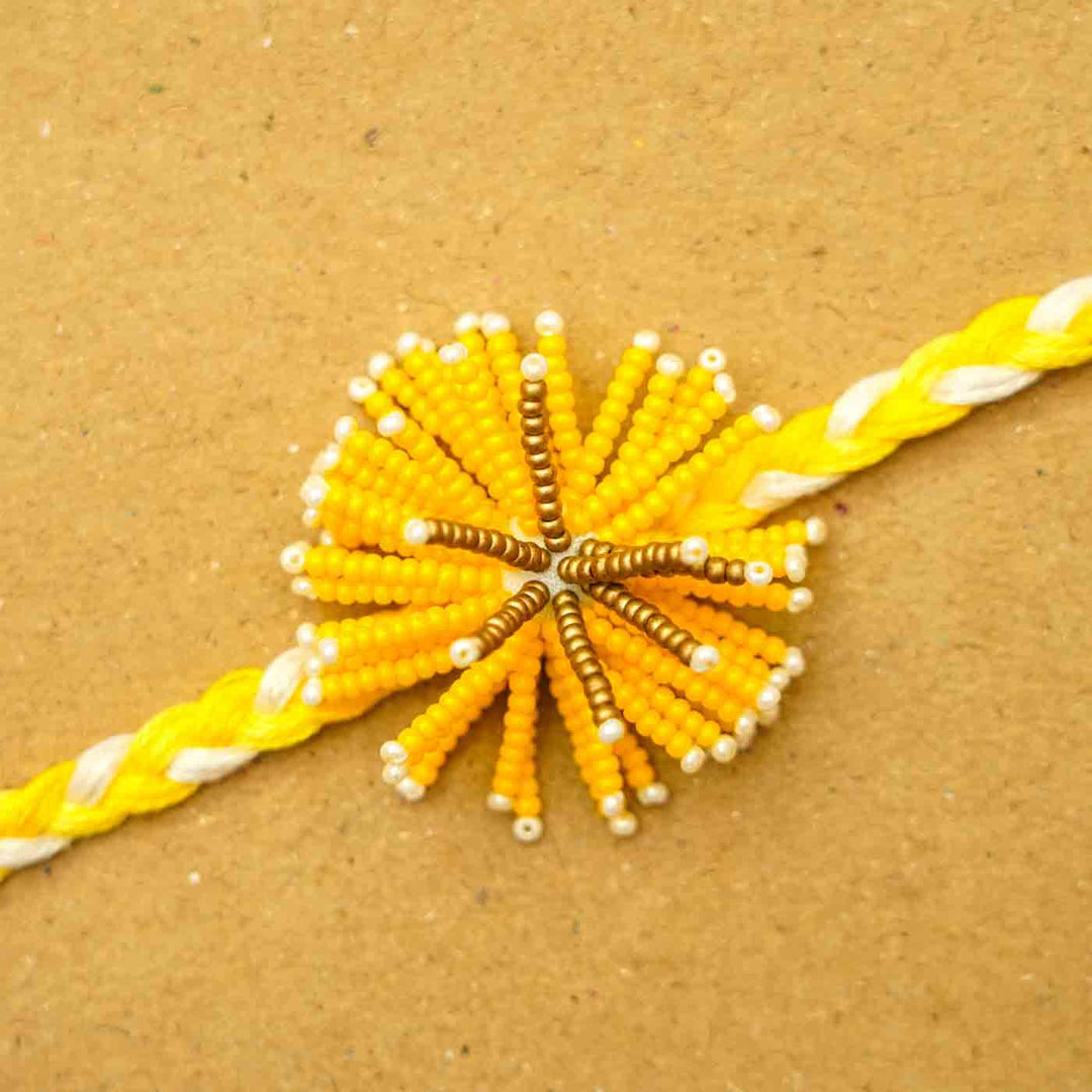 Reusable Beaded Yellow Flower Rakhi With Roli Chawal