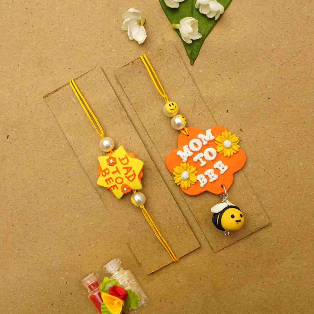 Handmade Parents To Be Clay Bhaiya Bhabhi Rakhi With Chocolates & Roli Chawal | Set Of 2