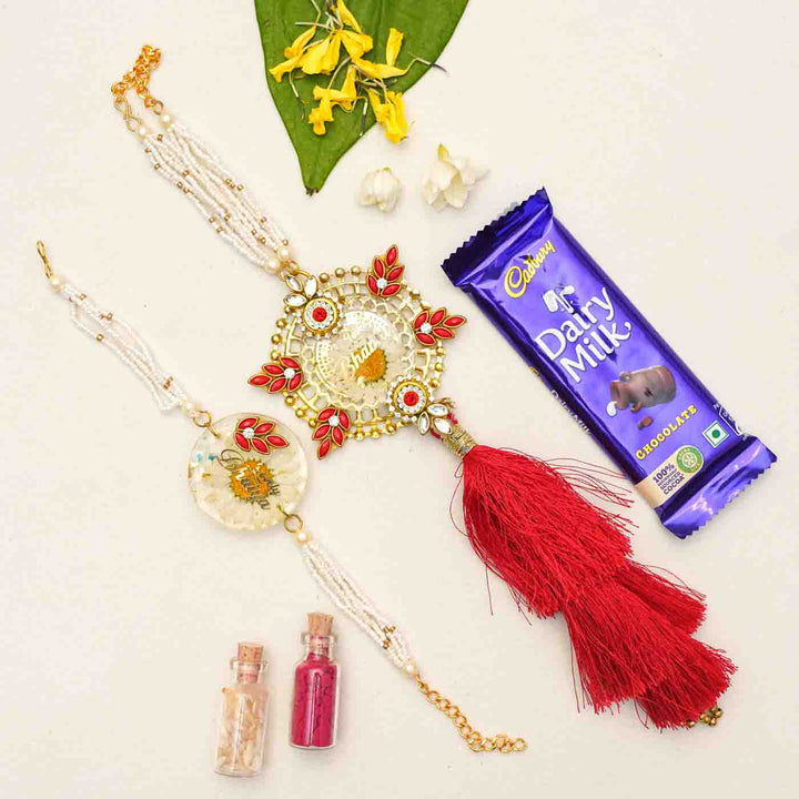 Handmade Resin Lovely Bhaiya & Lovely Bhabhi with Real Flower Rakhi With Chocolates & Roli Chawal | Set of 2