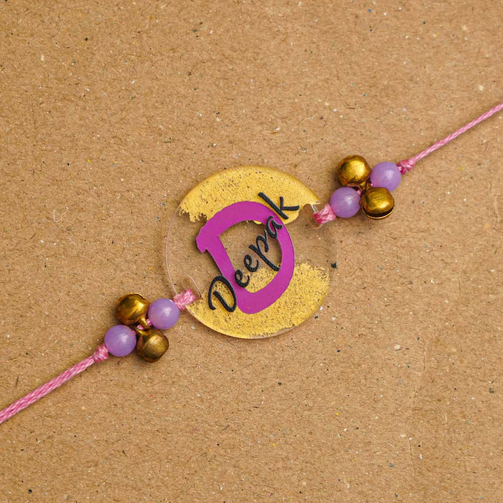 Personalized Handmade Name Golden Acrylic Rakhi With Roli Chawal