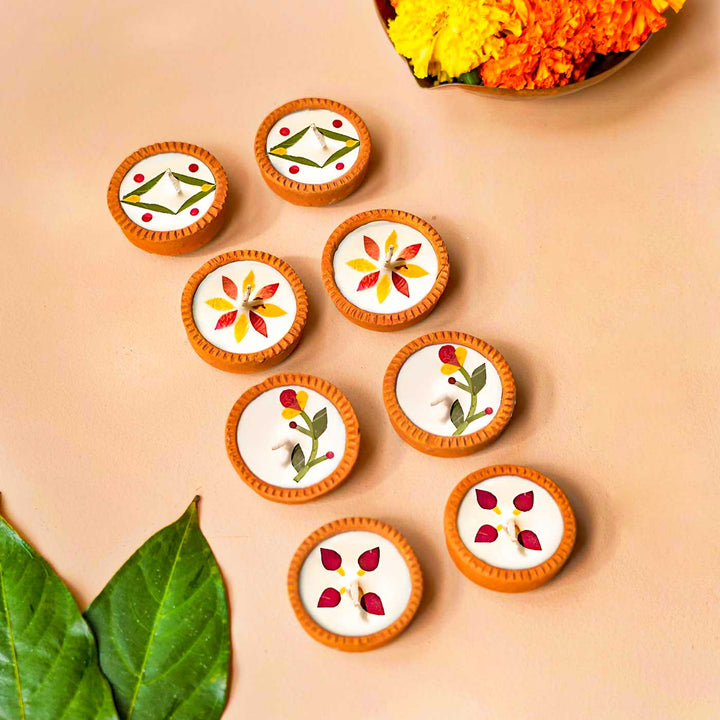 Handmade Festive Dry Flower Soy Wax Terracotta Diya | Set Of 16