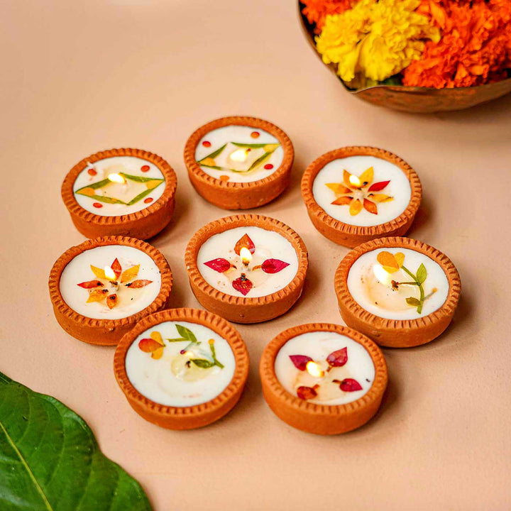 Handmade Festive Dry Flower Soy Wax Terracotta Diya | Set Of 16