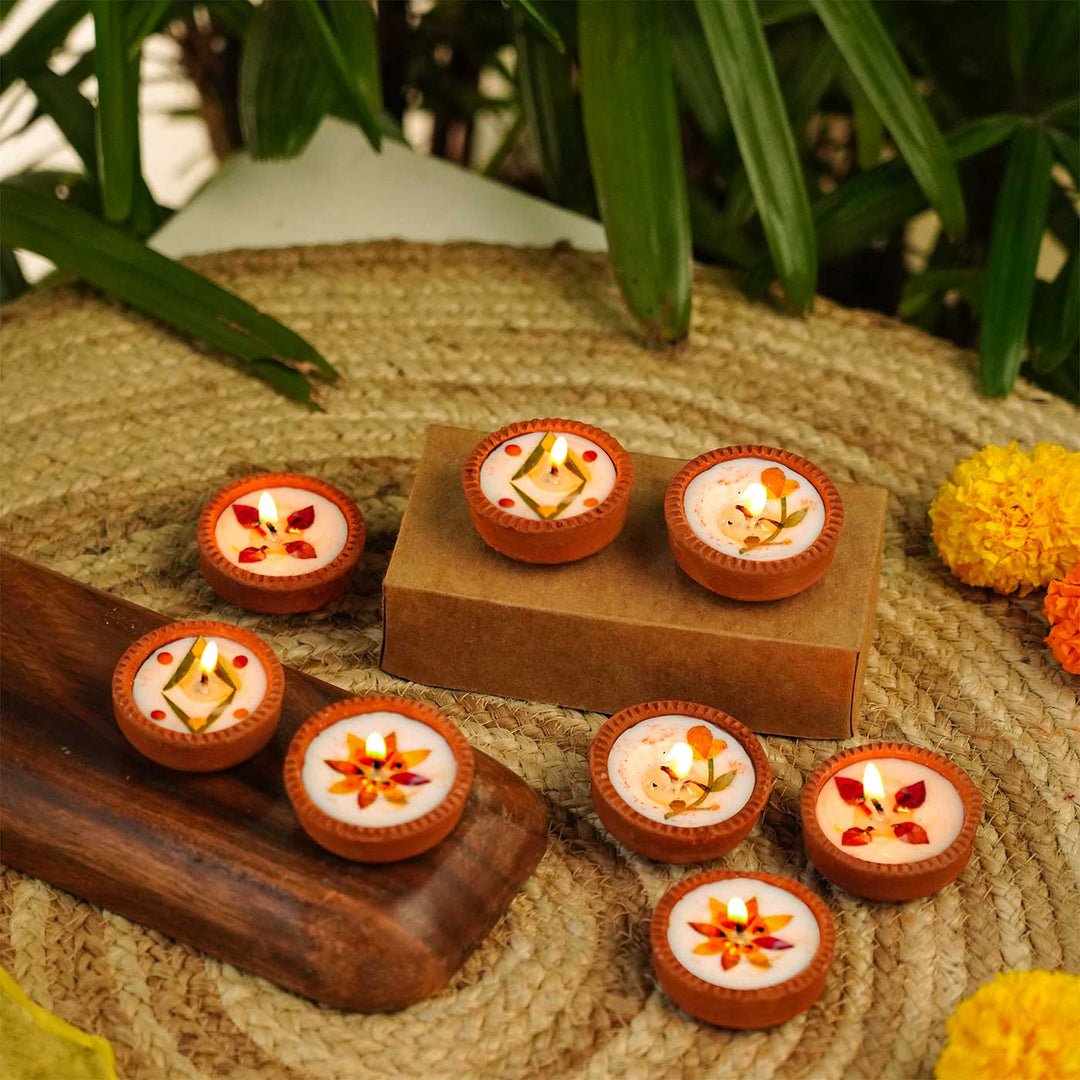 Handmade Festive Dry Flower Soy Wax Terracotta Diya | Set Of 16