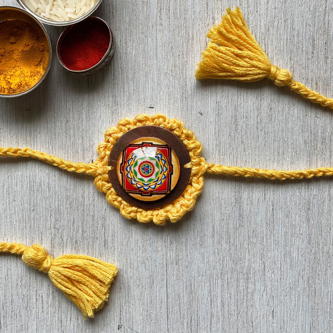 Handcrafted Crochet Folk Art Mandala Rakhi With Rice, Roli, Haldi