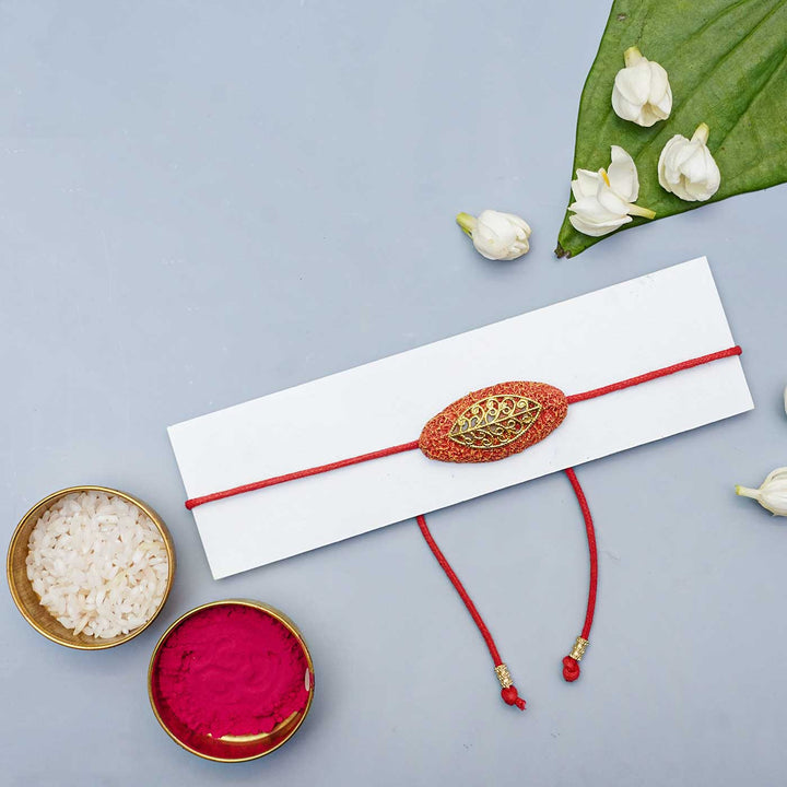 Handmade Papier Mache Naquashi Red Rakhi With Roli Chawal