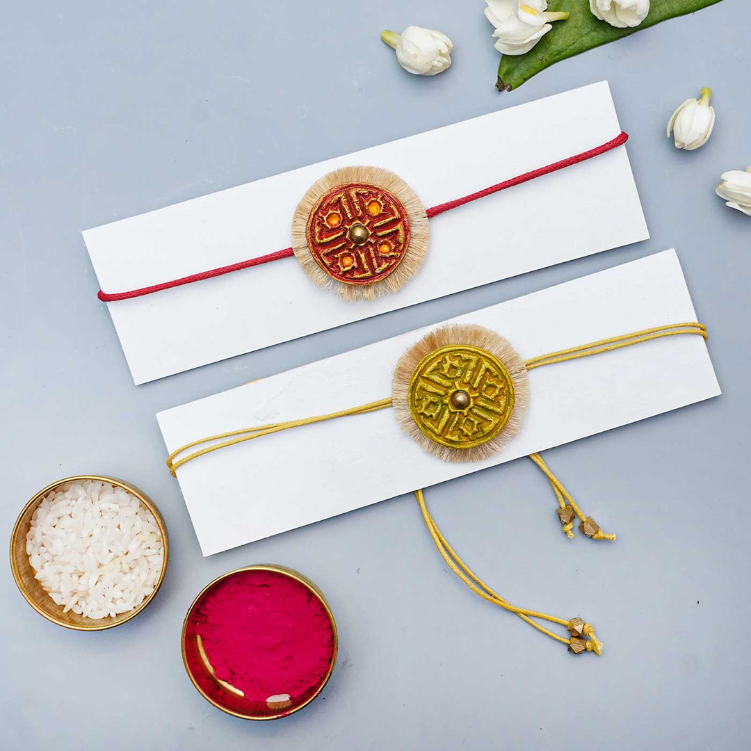 Handmade Papier Mache Red & Yellow Swastika Rakhi With Roli Chawal | Set of 2