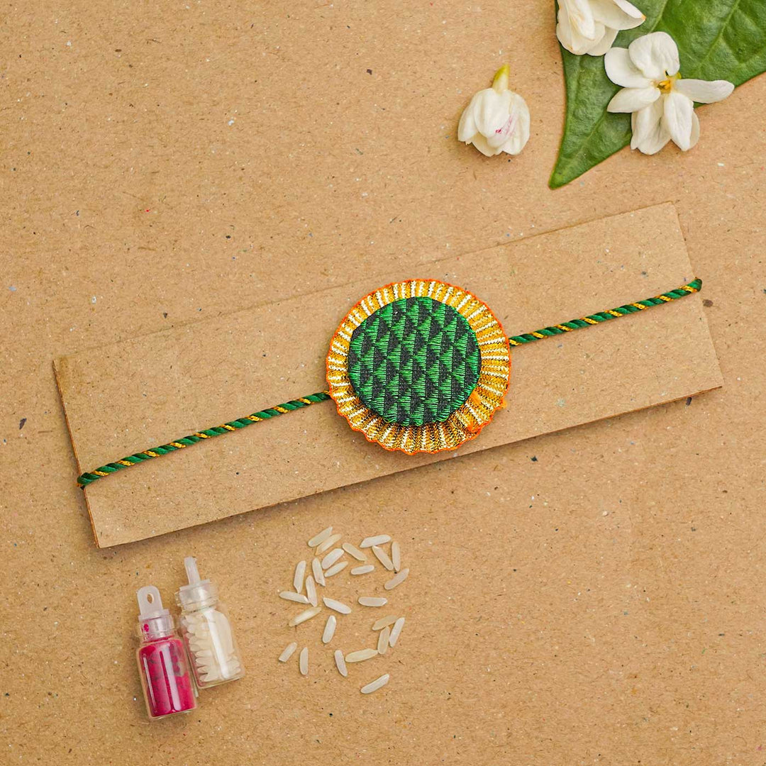 Handmade Round Khan Silk Rakhi With Chocolates & Roli Chawal