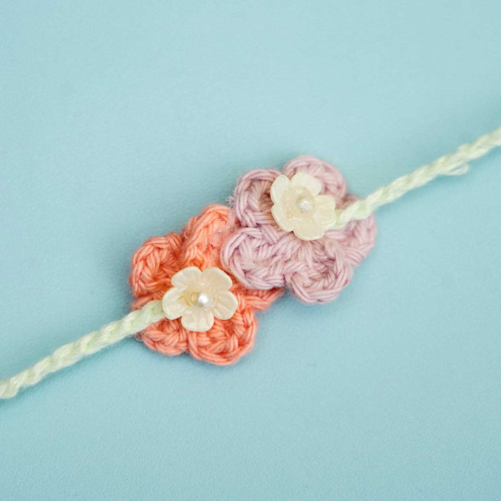 Handmade Crochet Forever Flowers Kids Lumba Rakhi With Roli Chawal