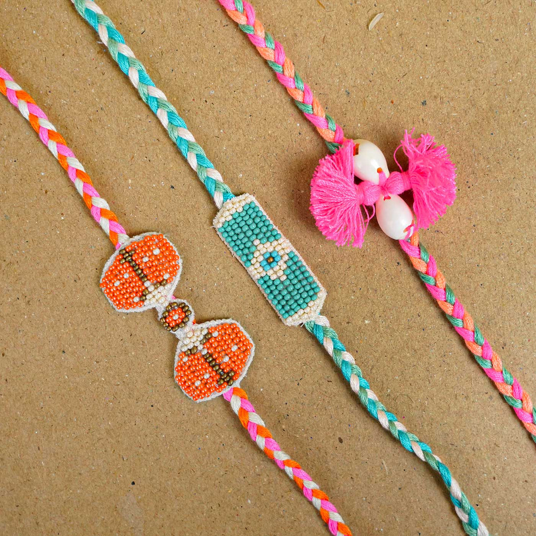 Reusable Beaded Orange Bug Rakhi With Roli Chawal