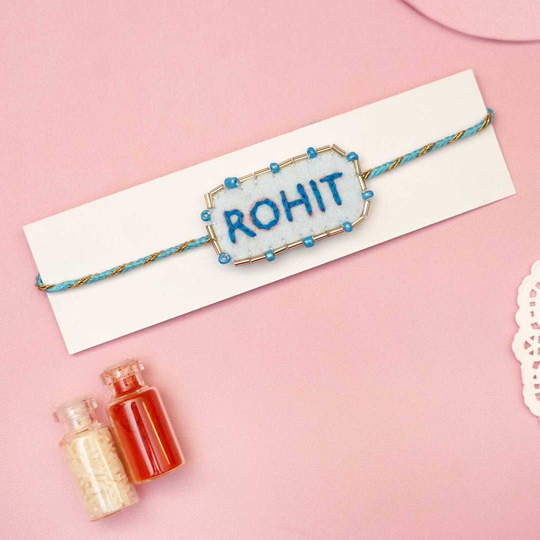 Personalized Handmade Blue Rectangle Felt Rakhi With Roli Chawal