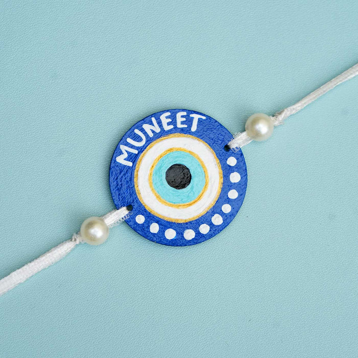 Personalized Hand-painted Evil Eye Themed Rakhi With Roli Chawal