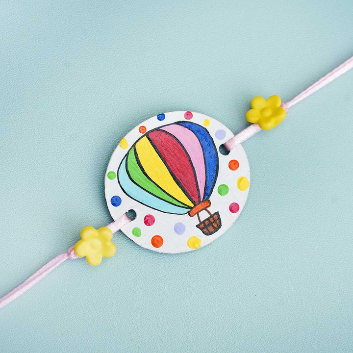 Hand-painted Hot Air Balloon Rakhi With Roli Chawal