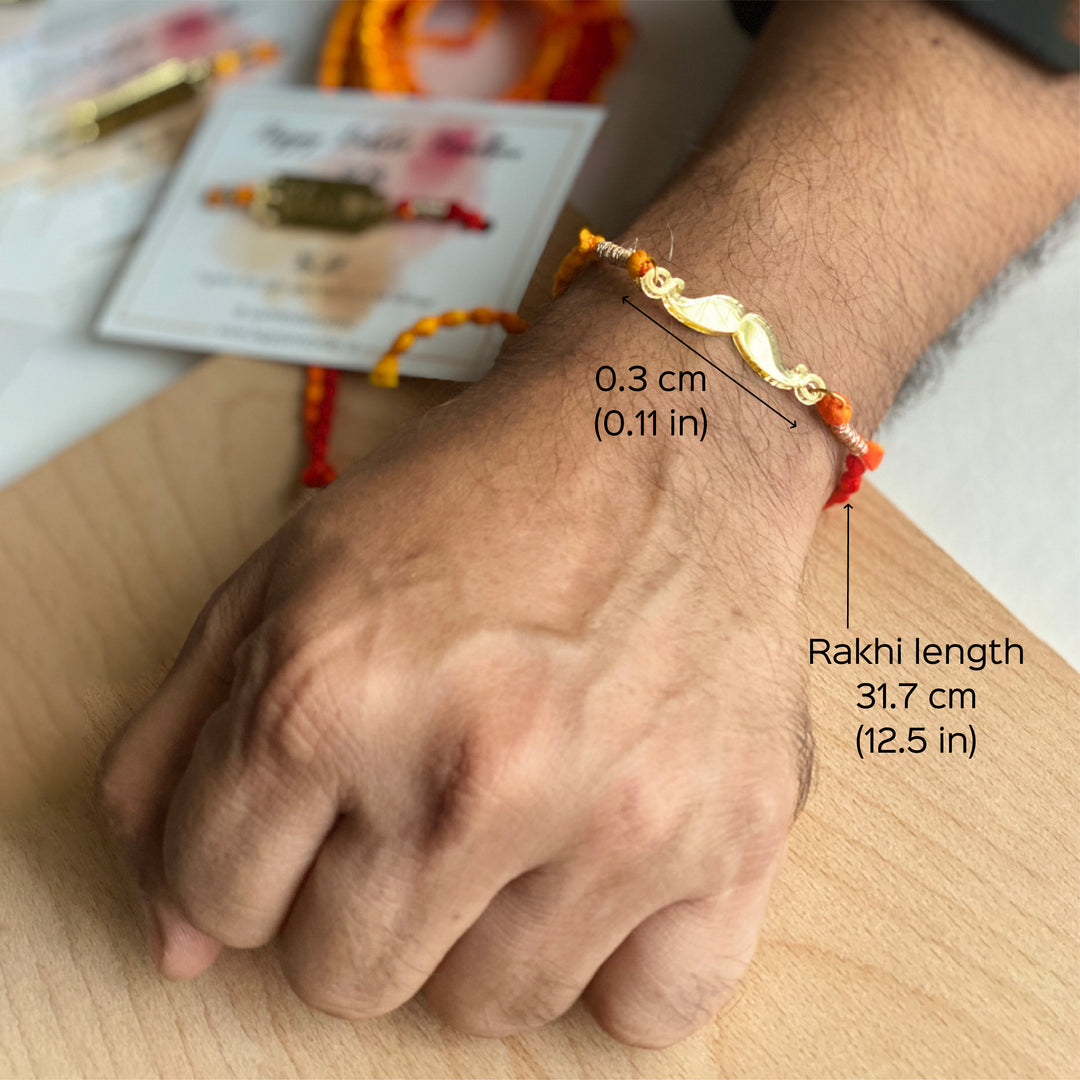 Handcrafted Golden Acrylic Rakhi With Roli Chawal