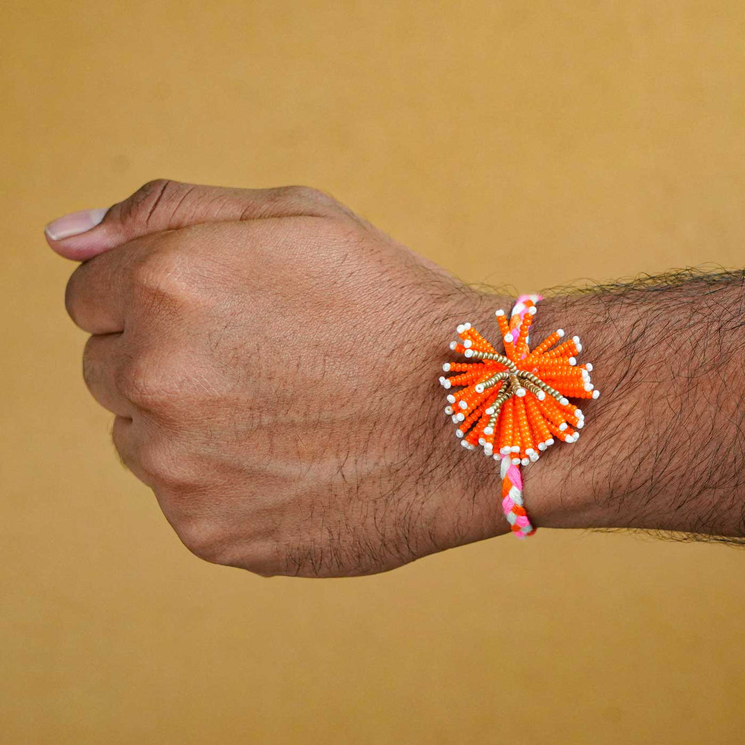 Reusable Beaded Orange Flower Rakhi With Roli Chawal