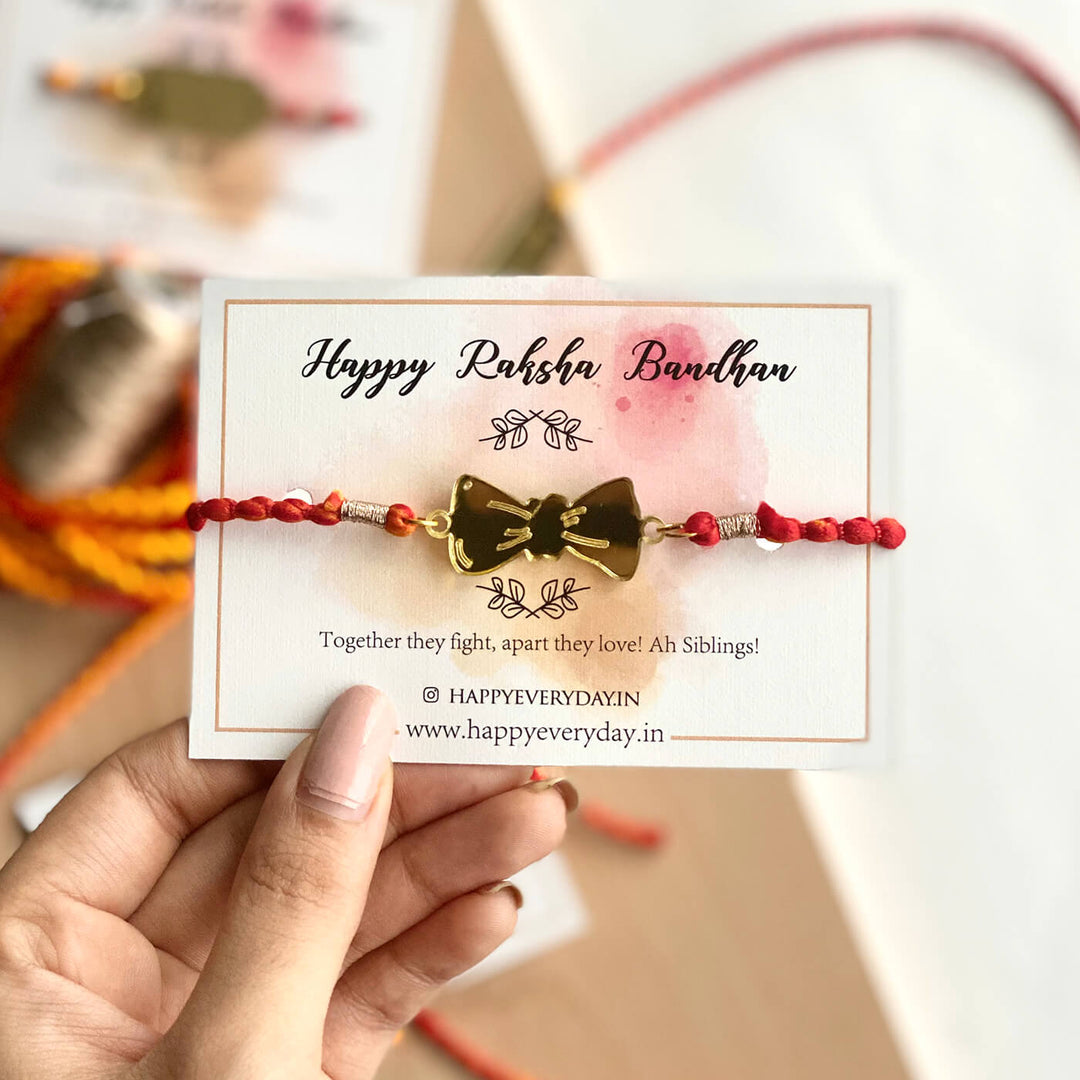 Handcrafted Golden Acrylic Rakhi With Roli Chawal