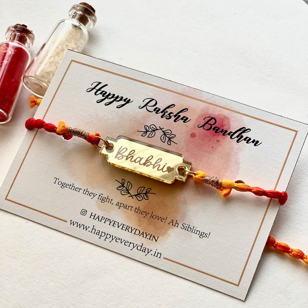 Handcrafted Golden Acrylic Rakhi With Roli Chawal