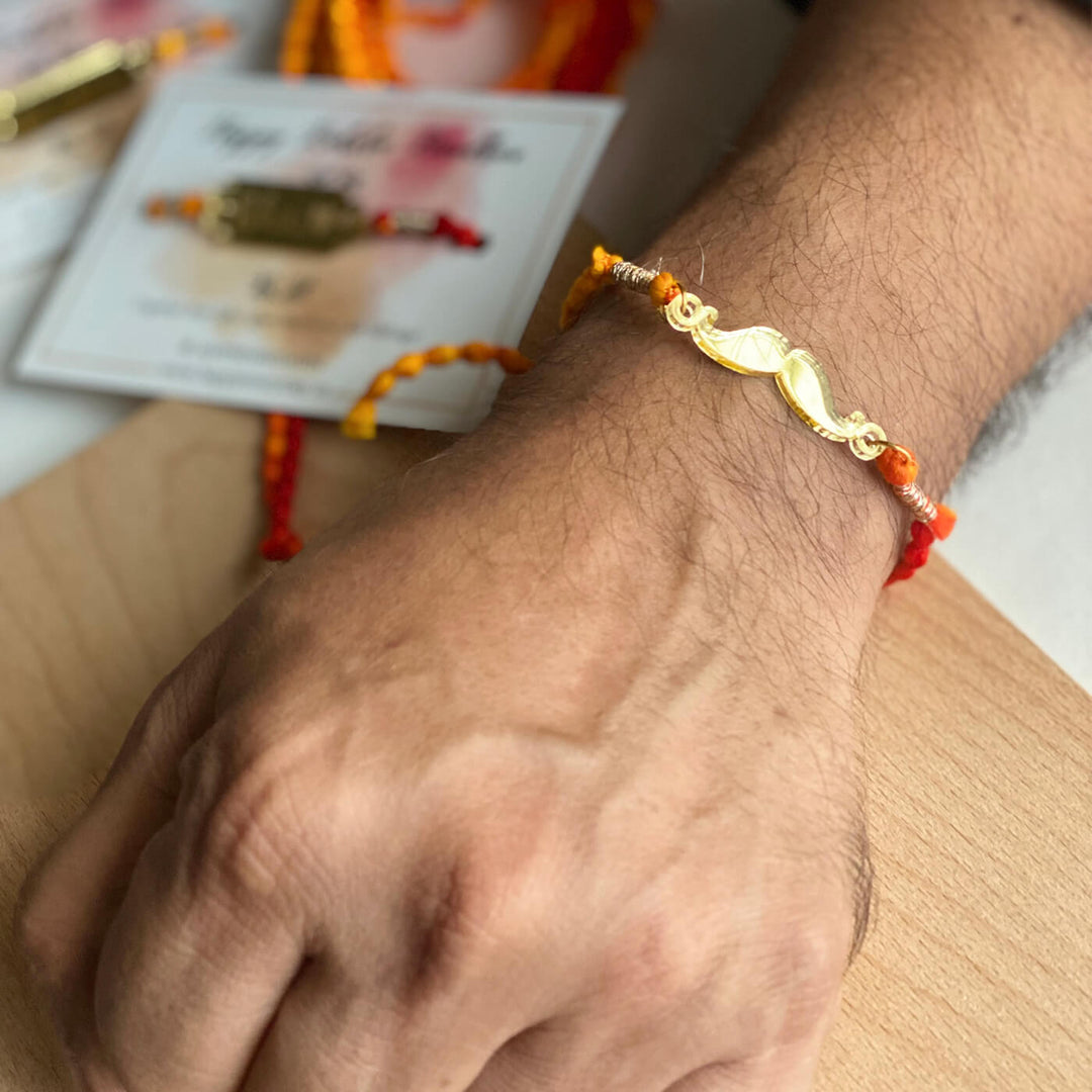 Handcrafted Golden Acrylic Rakhi With Roli Chawal