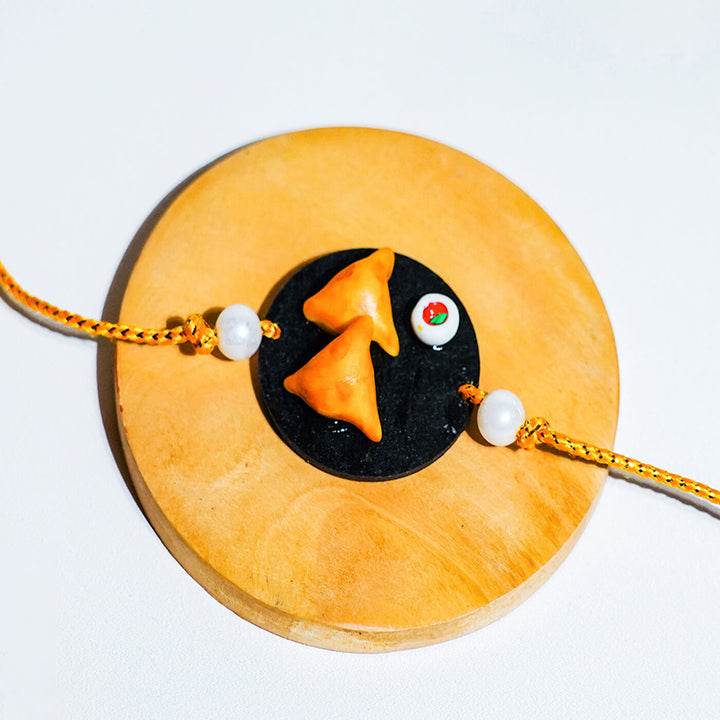 Handmade Samosa Food Themed Clay Rakhi With Roli Chawal