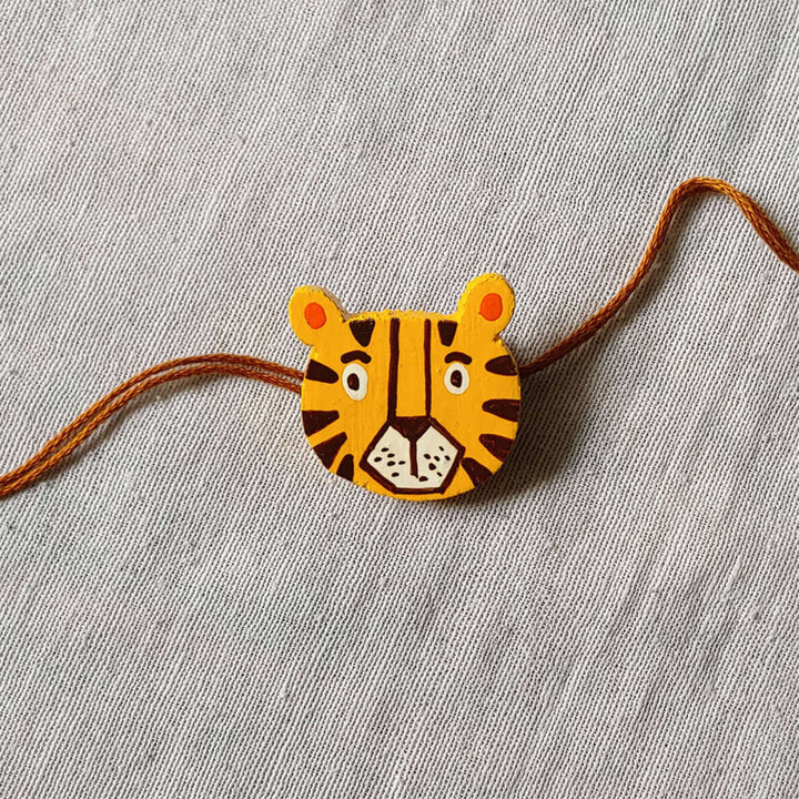 Handpainted Quirky Wooden Rakhi With Roli Chawal