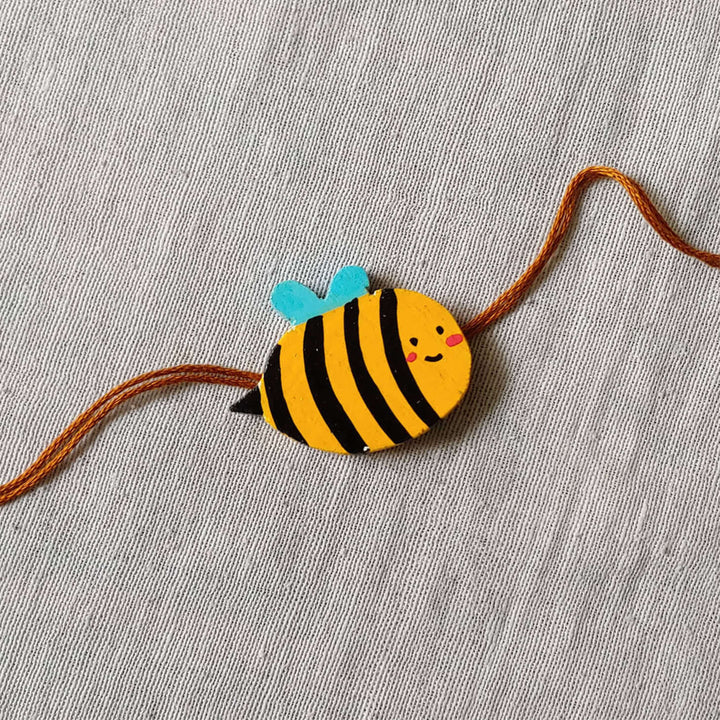 Handpainted Quirky Wooden Rakhi With Roli Chawal