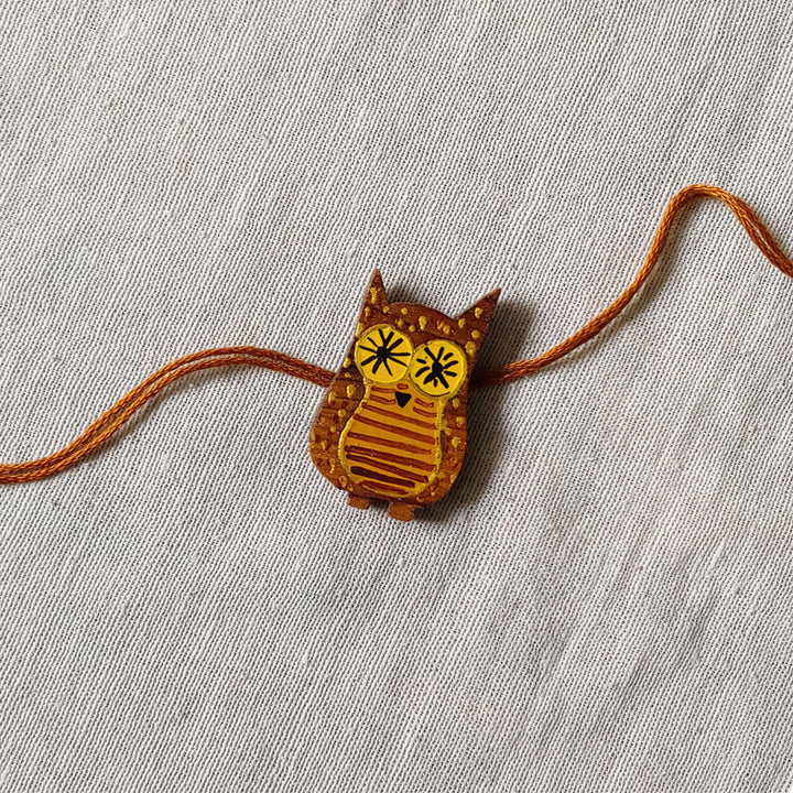 Handpainted Quirky Wooden Rakhi With Roli Chawal