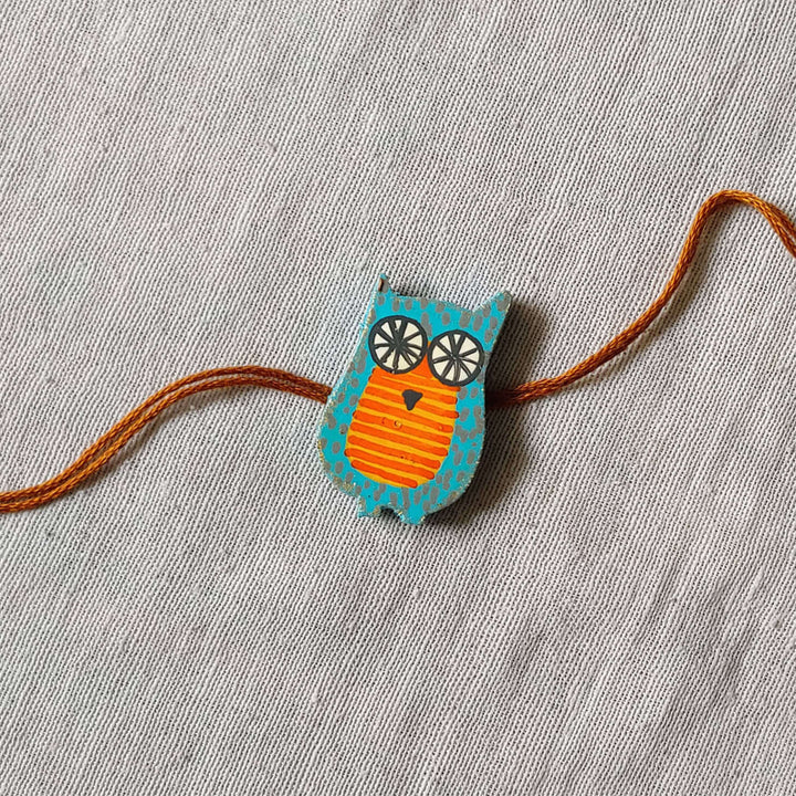 Handpainted Quirky Wooden Rakhi With Roli Chawal