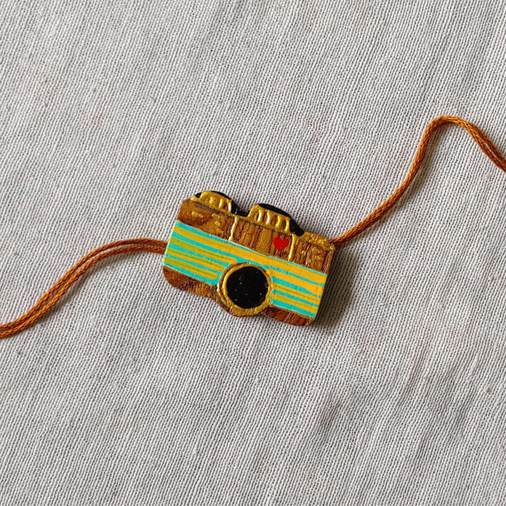 Handpainted Quirky Wooden Rakhi With Roli Chawal