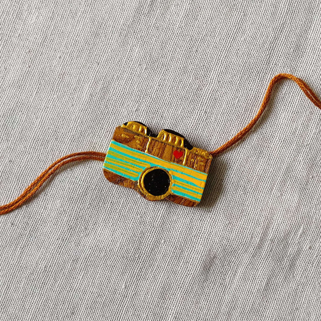 Handpainted Quirky Wooden Rakhi With Roli Chawal