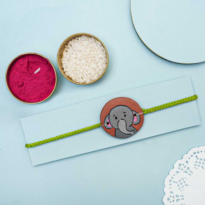 Hand-painted Grey Elephant Terracotta Rakhi With Roli Chawal for Kids