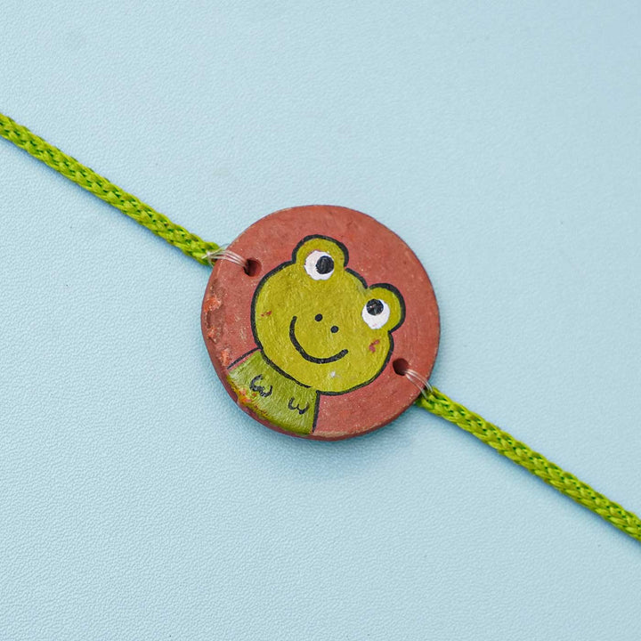 Hand-painted Frog Terracotta Rakhi With Roli Chawal for Kids