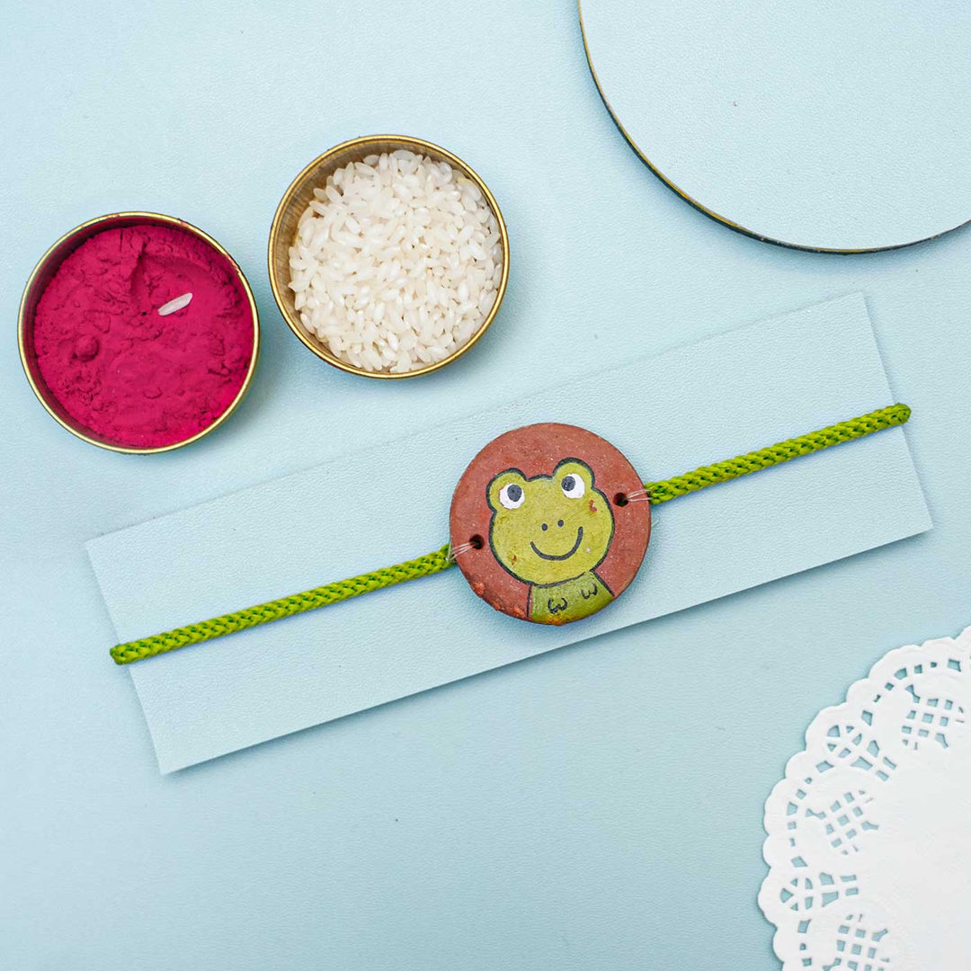 Hand-painted Frog Terracotta Rakhi With Roli Chawal for Kids