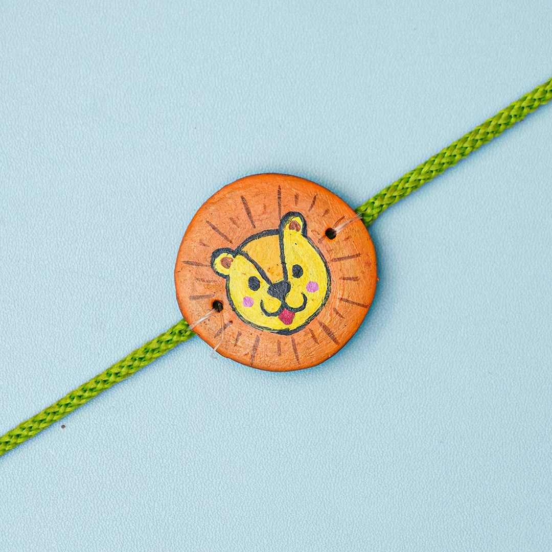 Hand-painted Panther Terracotta Rakhi With Roli Chawal for Kids