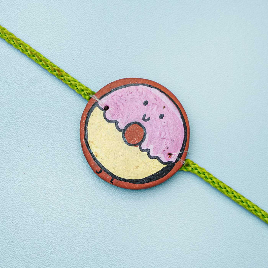 Hand-painted Donut Theme Terracotta Rakhi With Roli Chawal