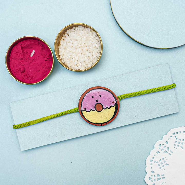 Hand-painted Donut Theme Terracotta Rakhi With Roli Chawal