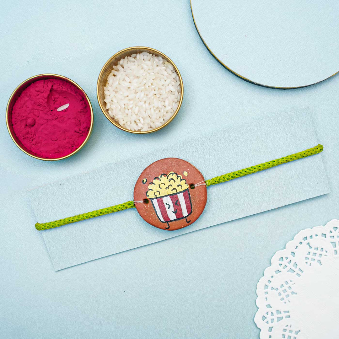 Hand-painted Popcorn Terracotta Rakhi With Roli Chawal