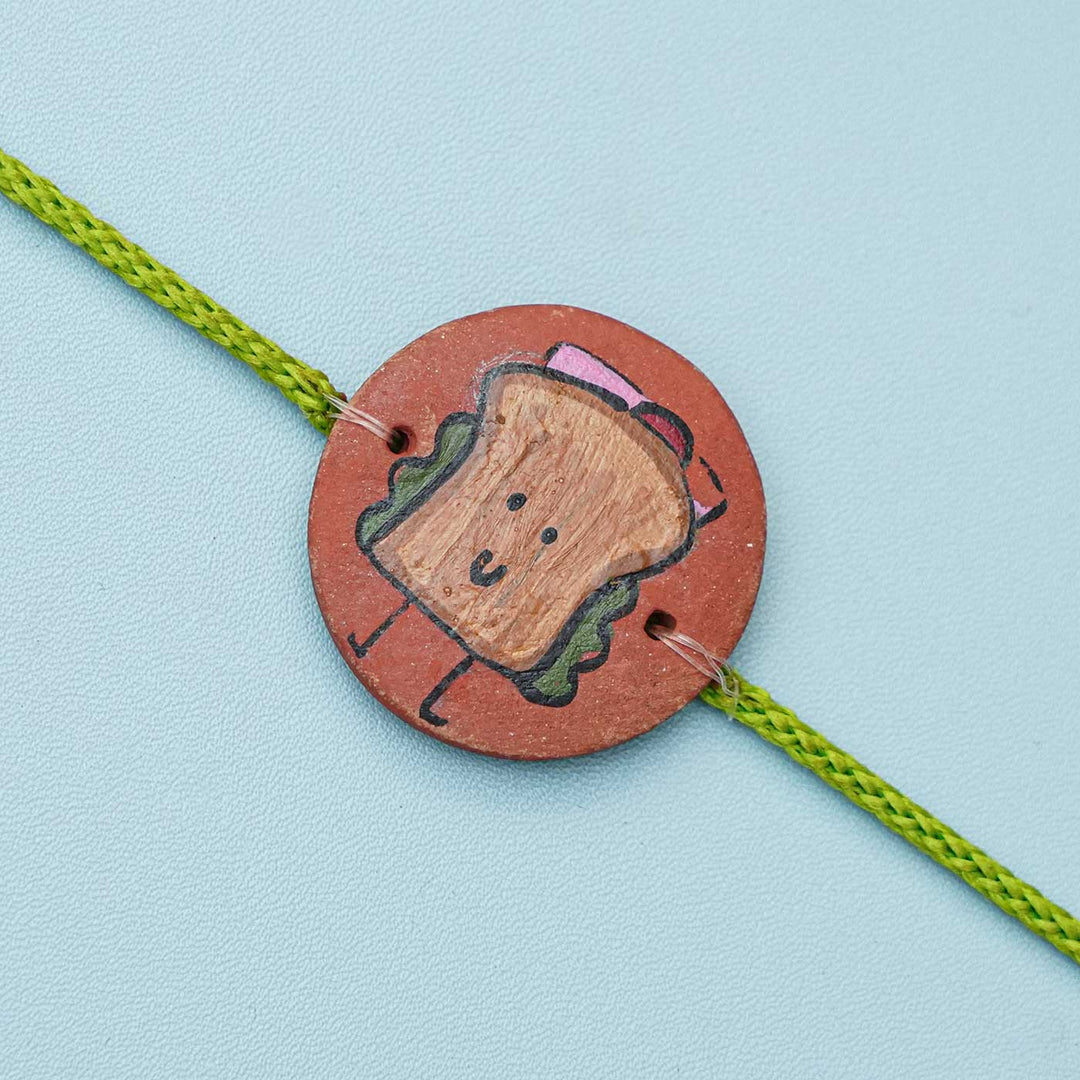 Hand-painted Sandwich Terracotta Rakhi With Roli Chawal